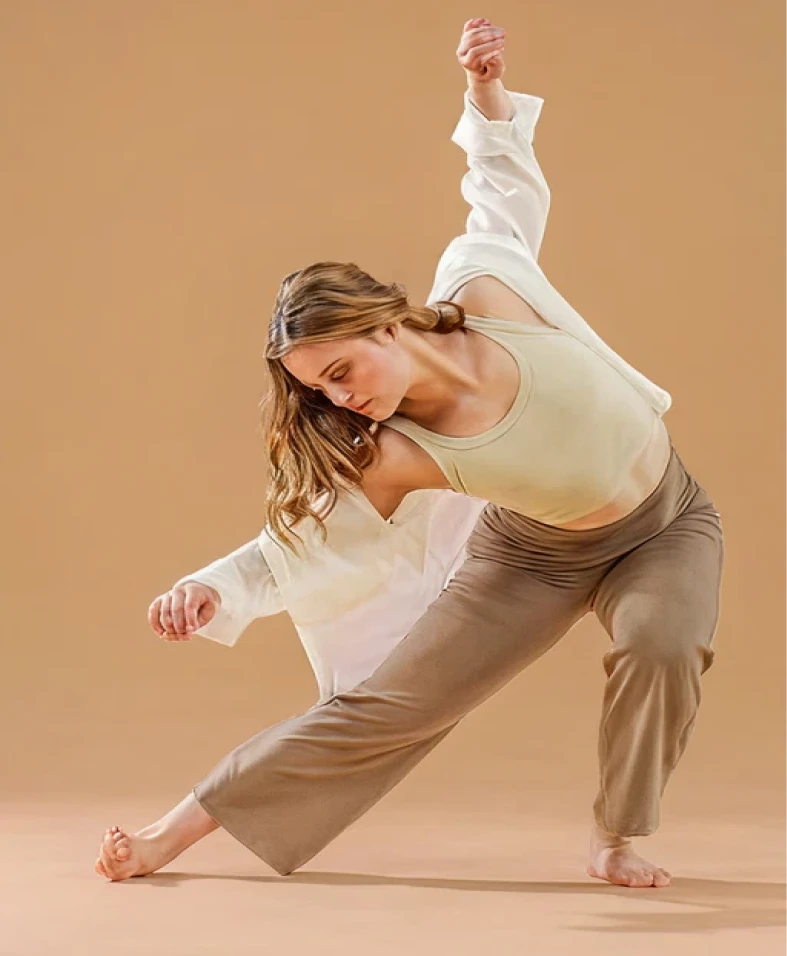 Woman performing elegant dance pose
