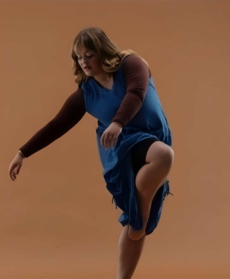 Woman in blue dress dancing